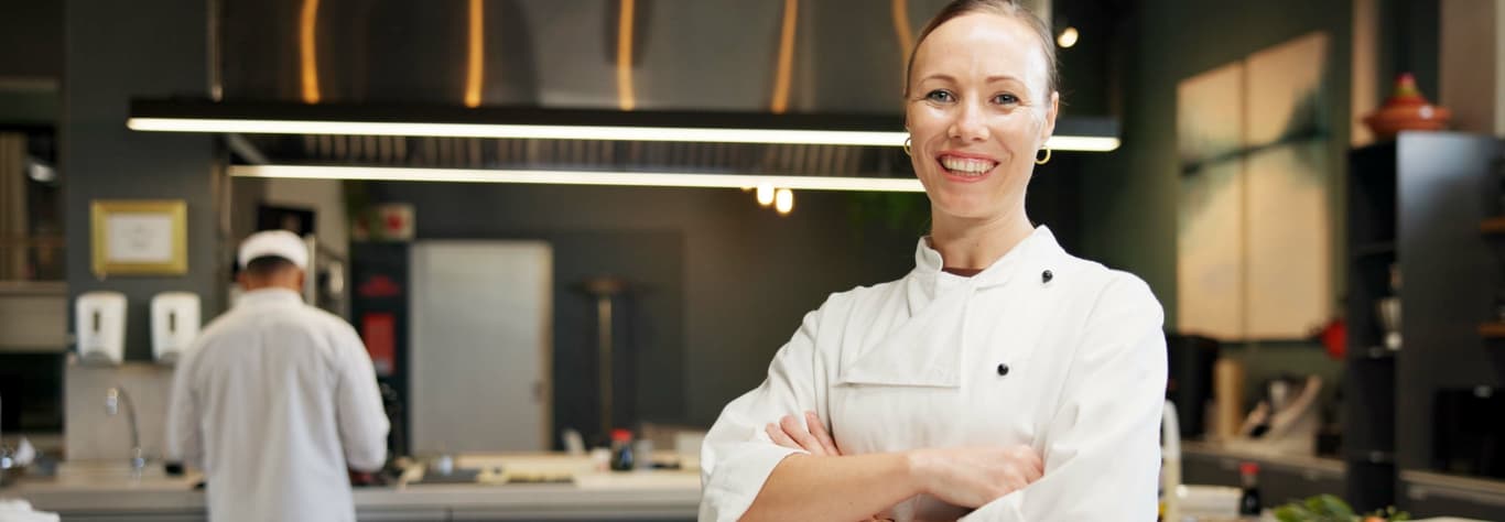 kitchen staff in catering uniform