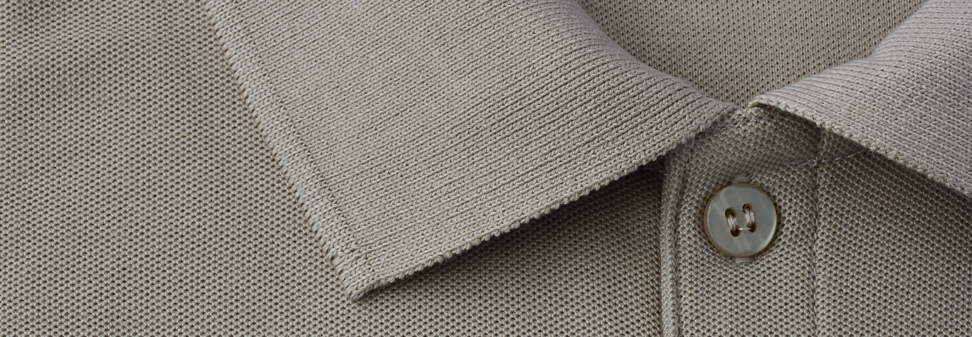 close up of polo shirt collar and buttons